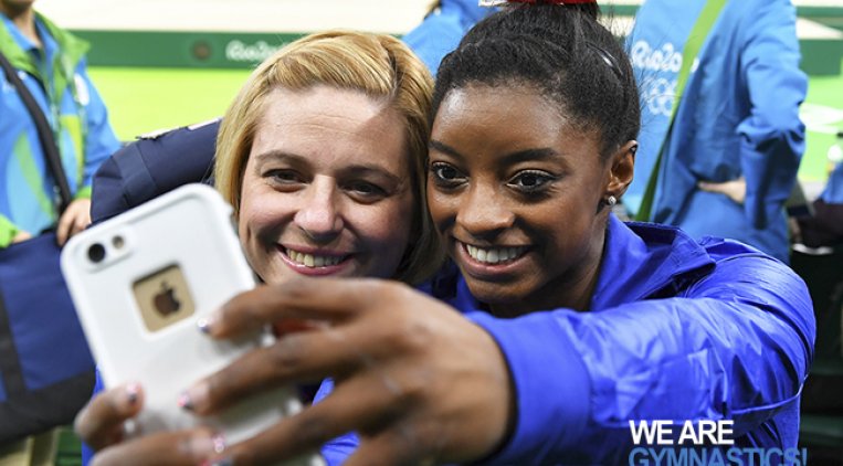 Simone Biles and her coach Amy.jpg